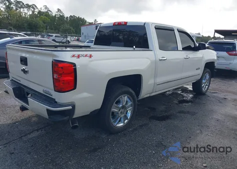 2014 Chevrolet Silverado 1500 High Country из США, поврежденный, VIN 3GCUKTEJ2EG318221